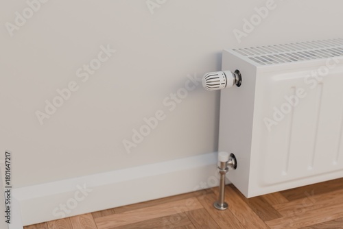 Wallpaper Mural Thermostatic radiator valve on modern panel heater, selective focus. Torontodigital.ca