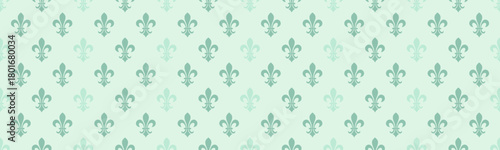 Elegant pastel green fleurdelis pattern.  Subtle texture and repeating design ideal for backgrounds, websites, or stationery.