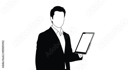 Silhouette of a businessman in a suit holding a tablet computer with a blank screen