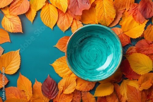 Colorful Autumn Leaves Scattered on a Blue Wooden Surface During the Fall Season