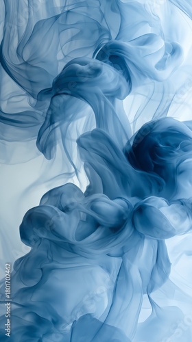 Soft Blue Fabric Flows Gently, Creating Serene Waves and Smooth Curves in Lig...