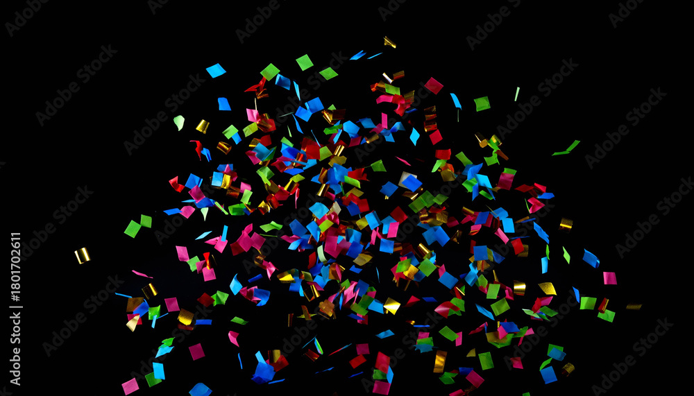 Obraz premium Colorful confetti explosion on a black background, celebrating joy and festivity for a party