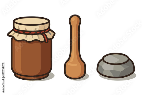 Traditional kitchen items: jar of preserves, wooden dipper, and stone mortar