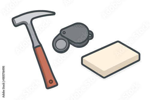 Essential geology field equipment set featuring a rock hammer, hand lens, and specimen block