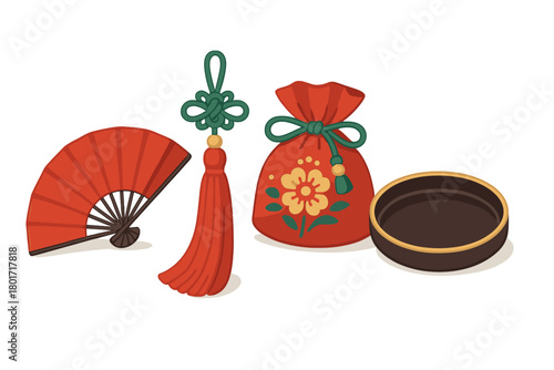 Red folding fan, decorative tassel, and lucky pouch set of traditional Asian cultural objects