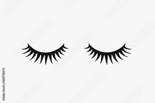 Stylized closed eyes with long dramatic black eyelashes graphic element