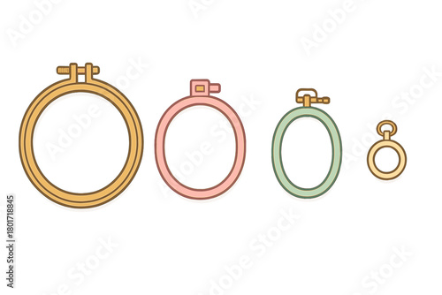 Four embroidery hoops in assorted sizes and vibrant colors