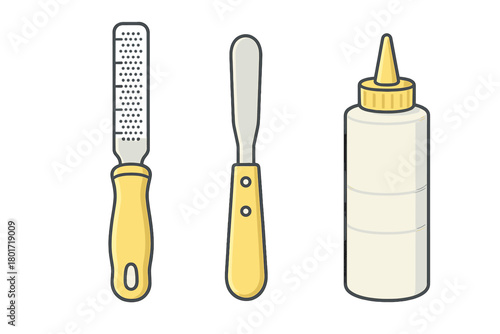 Essential kitchen utensils: zester, spatula, and sauce squeeze bottle