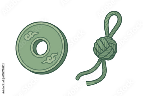 Ancient Asian coin with cloud patterns and a decorative green rope knot charm