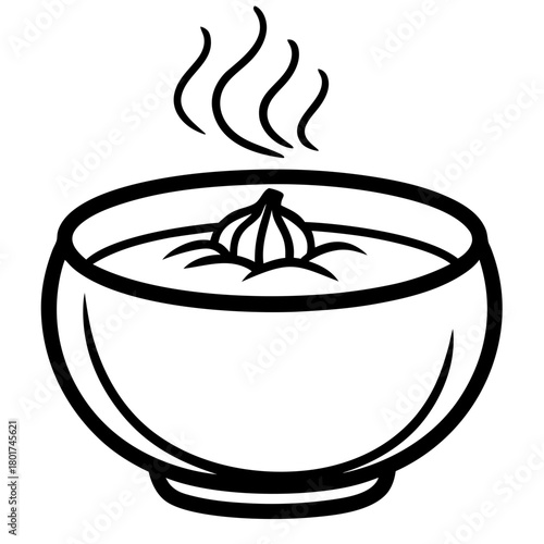 Bowl of garlic soup with steam