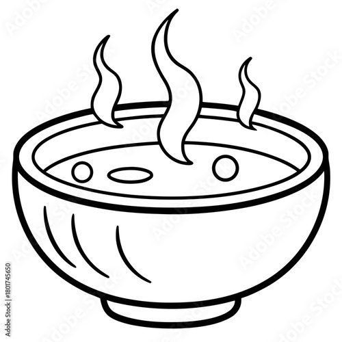 Bowl of hot soup with steam