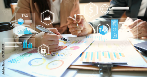 Business people organizing tax checklist through virtual interface. Tax planning services to maximize tax savings and optimize business finances