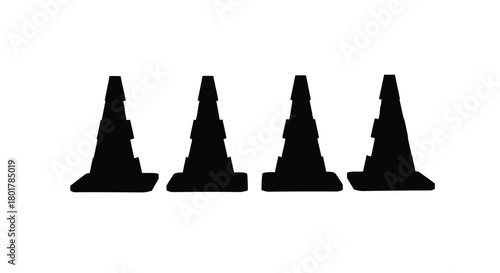Four traffic cones in silhouette for safety