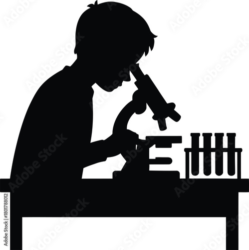 A silhouette of a young scientist diligently working with a microscope