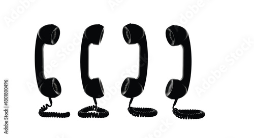 Four black telephone handsets are in a row