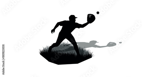 Silhouette of baseball player catching ball on grass with shadow