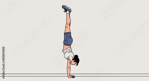 Dynamic young woman masterfully performing a handstand, showcasing strength and athletic grace in a clean, modern aesthetic
