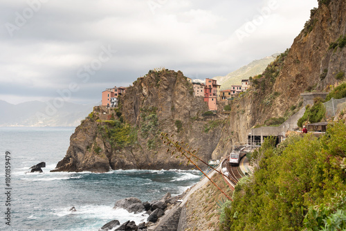 Manarola train station in famous village with colorful houses on cliff over sea in Cinque Terre in autumn, Ligury, Italy