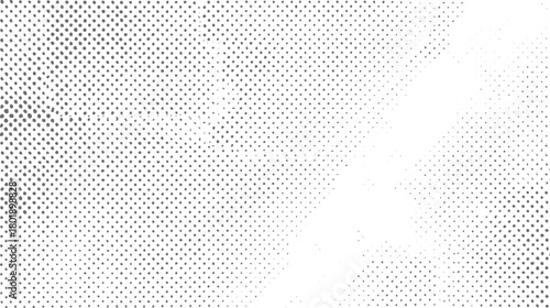 Tableau sur toile Abstract grayscale halftone dot pattern fading from dense to sparse on white bac