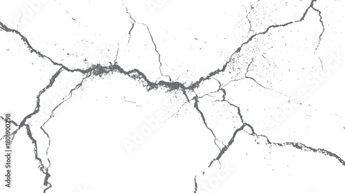Abstract grey cracks and speckles on a white background representing a textured surface or distressed pattern
