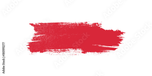 Red paint brush stroke with textured edges and speckles on a white background vector