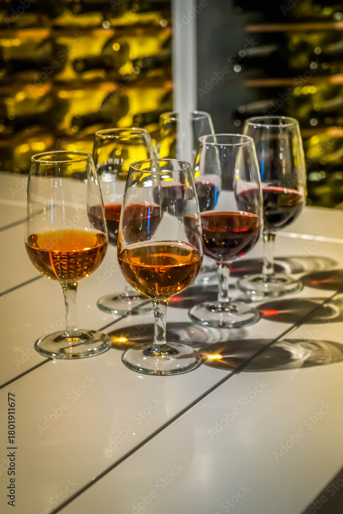 Fototapeta premium port wine testing, glasses with drink - white and red