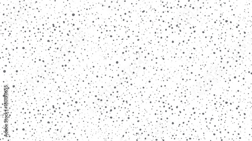 Seamless pattern of scattered grey dots of varying sizes on a white background abstract texture black