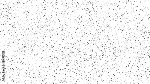 Scattered small dark grey dots and irregular shapes on a clean white background texture pattern spots