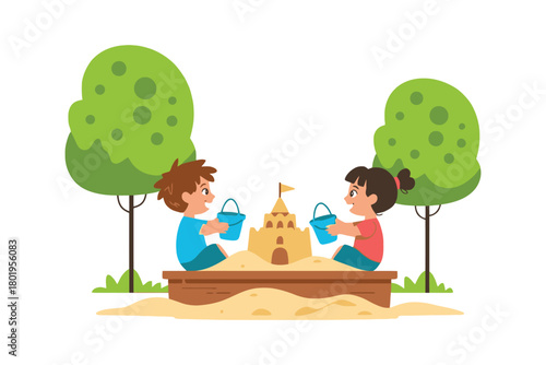 Two children build a sandcastle together in a sandbox with trees in the background.