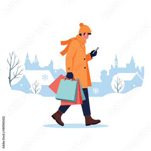 Man in winter clothes with shopping bags walking through a snowy city while looking at his smartphone.