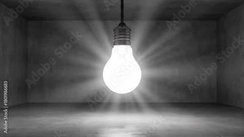 Illuminated light bulb in dark room concept
