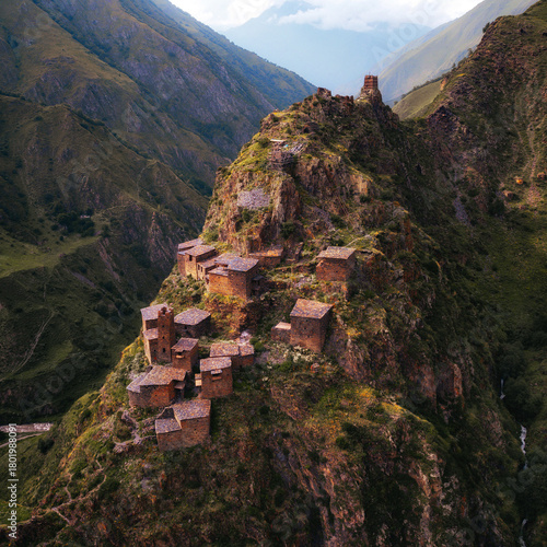 Ruined abandoned medieval village and fortress Muzo (Mutso). Khevsureti Region, Georgia, Caucasus. High quality photo