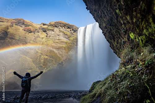 Skógafoss thunders down with unstoppable force, often crowned by a rainbow—a true Icelandic spectacle