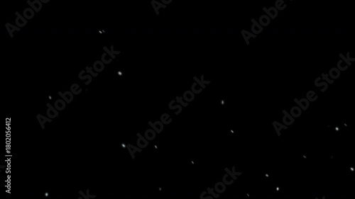 Animated video simulating snowflakes falling on a black background. Ideal for overlay and composition.