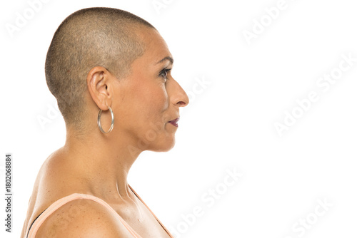 Slika na platnu Side profile of bald woman looking forward, concept for self-awareness, confidence, identity, lifestyle, editorial, beauty standards, mental health, body positivity
