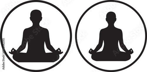 Two figures in meditation pose silhouette