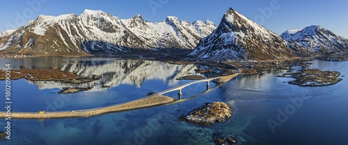 Aerial view of bridge, fjord, steep mountains, coast, winter, panorama, evening light, reflection, Moskenesoya, Lofoten, Norway