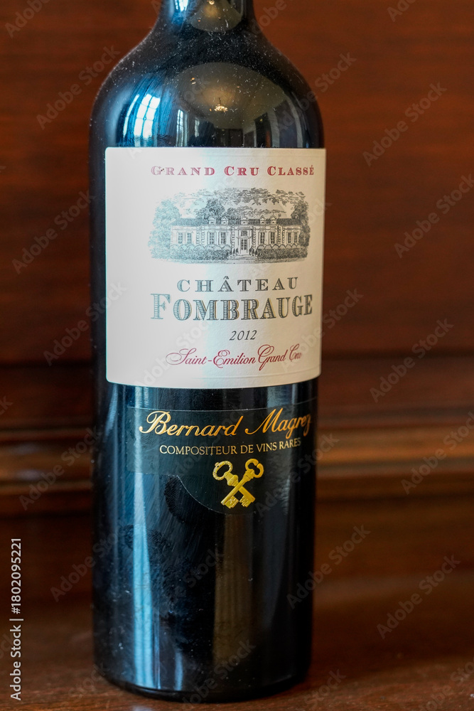 Obraz premium chateau fombrauge logo brand and text sign 2012 bottle of wine legendary grand cru classe of saint-emilion of bernard magrez owner of large international vineyards