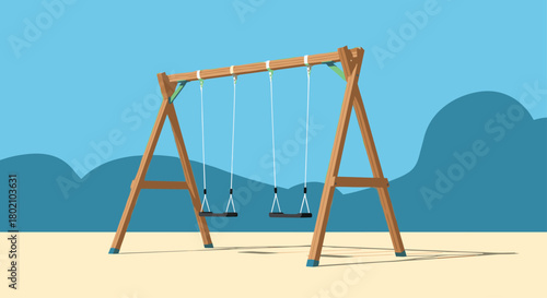 A brightly colored wooden swing set stands on a sandy surface against a backdrop of rolling blue hills, offering a classic childhood play experience.