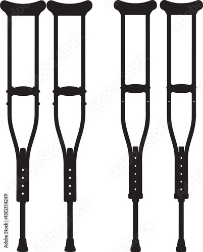 Two pairs of medical crutches silhouette