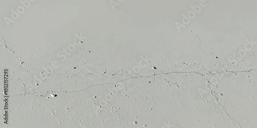 Close up of a textured concrete surface with small imperfections and subtle color variations.