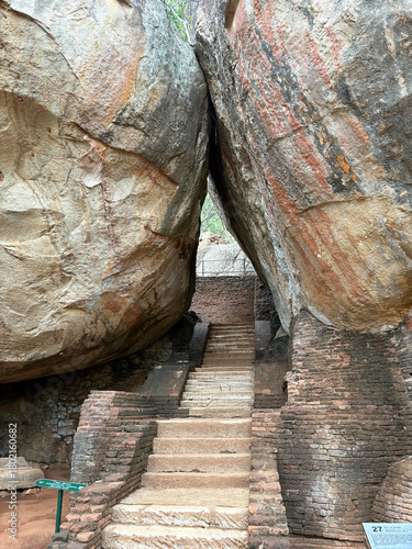 Sigiriya Rock, The long flight of steps through the cliff at the base of Lion Rock lead to the ancient Rock Fort at the top of the montain.