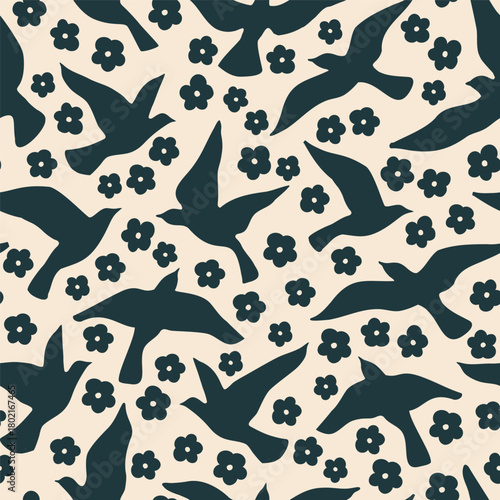 Abstract flying birds on simple little flowers background. Silhouettes of pigeons, doves daisy florals seamless pattern. Vector illustration for minimal textile fabric print design