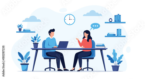 Two professionals are engaged in a focused conversation at a modern office desk, likely discussing work or conducting an interview, with a relaxed atmosphere.