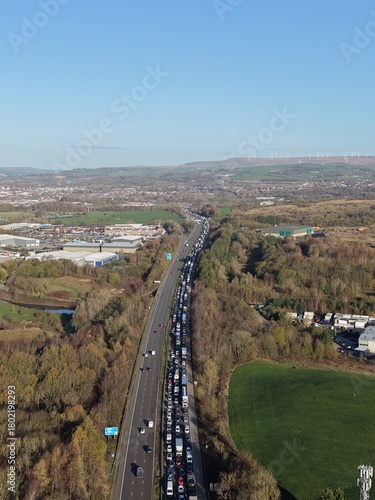 Aerial view of busy traffic on a motorway in greater Manchester  with lane closures. Bury Manchester England. 