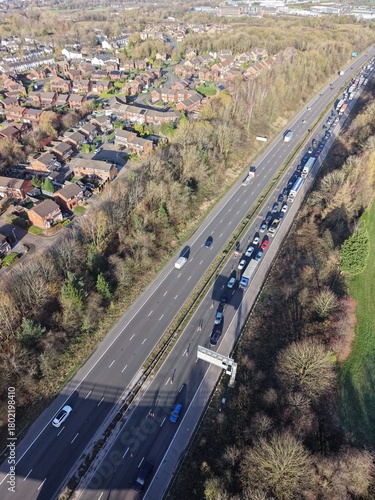 Aerial view of busy traffic on a motorway in greater Manchester  with lane closures. Bury Manchester England. 