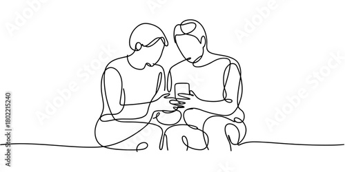 two individuals sitting together and looking at a smartphone, symbolizing connection, communication, and modern technology.