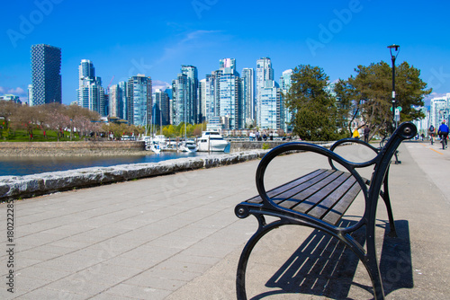 Promenade and Park Bench Overlooking Vancouver Skyline and False Creek Marina