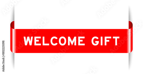Red color inserted label banner with word welcome gift on white background