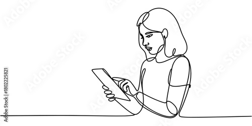 a woman interacting with a digital tablet, symbolizing modern technology, online learning, and digital communication.